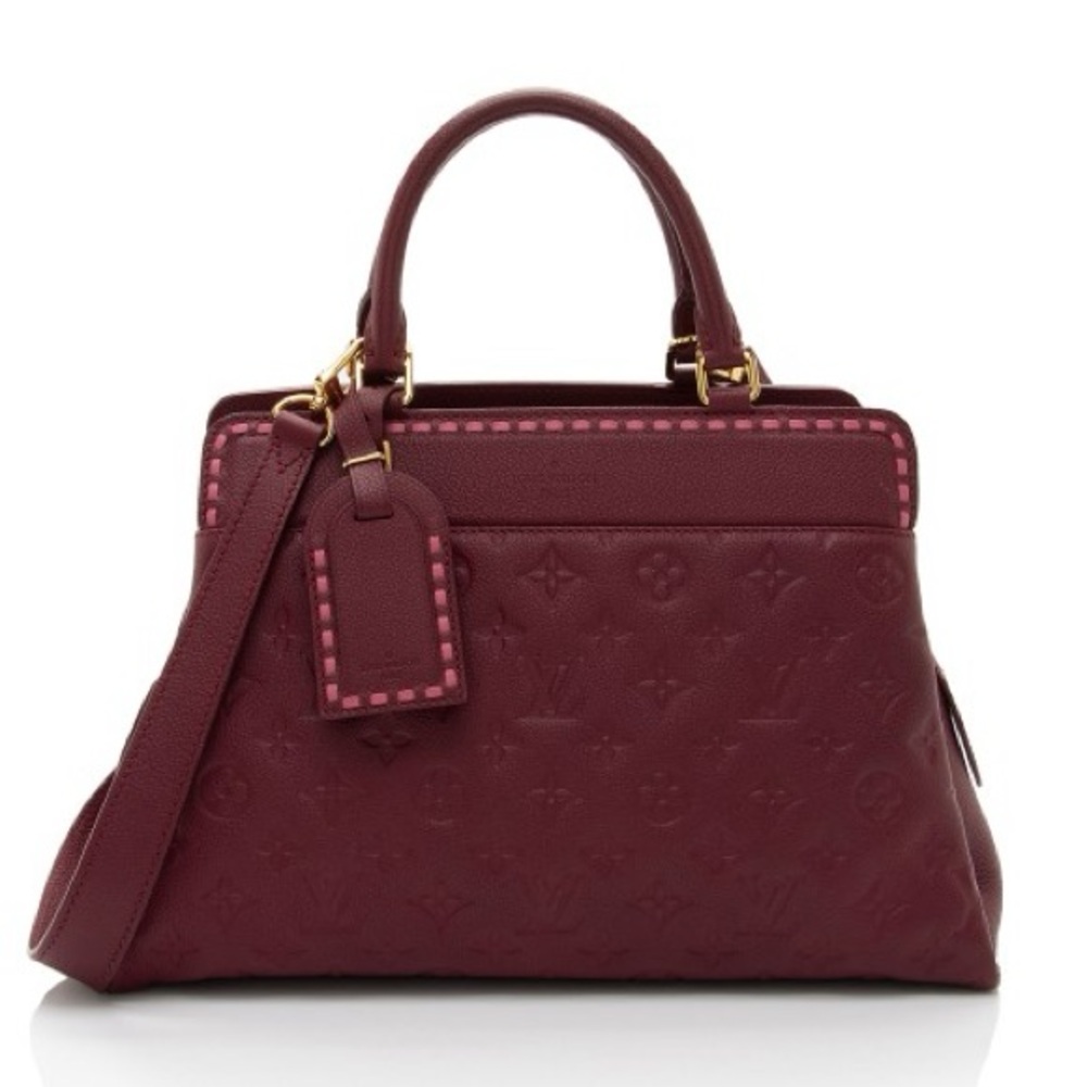 Louis Vuitton: Burgundy Monogram Empreinte Vosges MM satchel